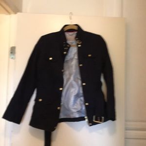 Navy blue jacket with brass hardware